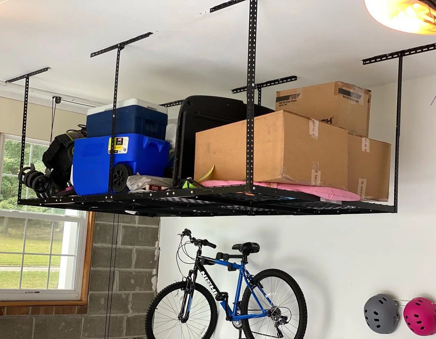 It&rsquo;s the best time to organize your garage before the weather gets cold! Having an overhead storage rack has been one of the best things we have done with our garage! It&rsquo;s a great option to store seasonal and unused items. If you are read