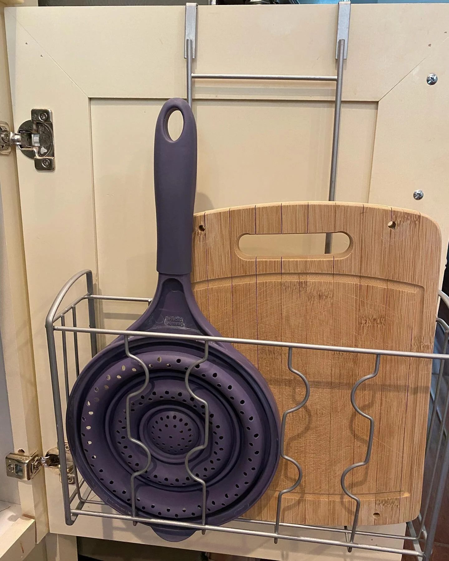 A good inside the cabinet door organizer can be a game changer especially when you aren&rsquo;t working with a ton of storage space! I love this organizer from @amazonhome thats great for cutting boards, cookie sheets, bakeware pans, plastic food wra