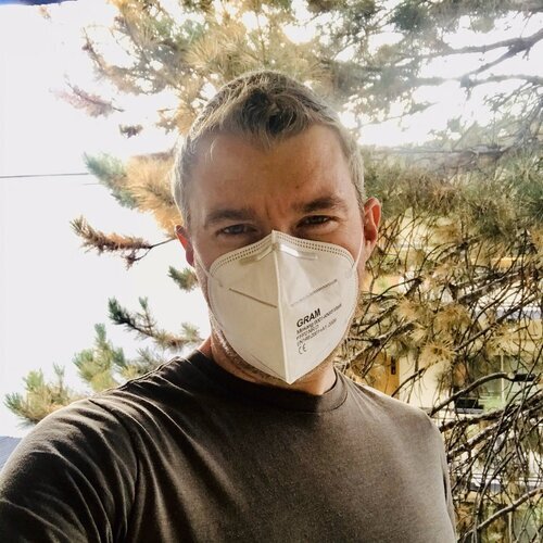 Worker enjoying one fo CovCare’s donted KN95 masks.