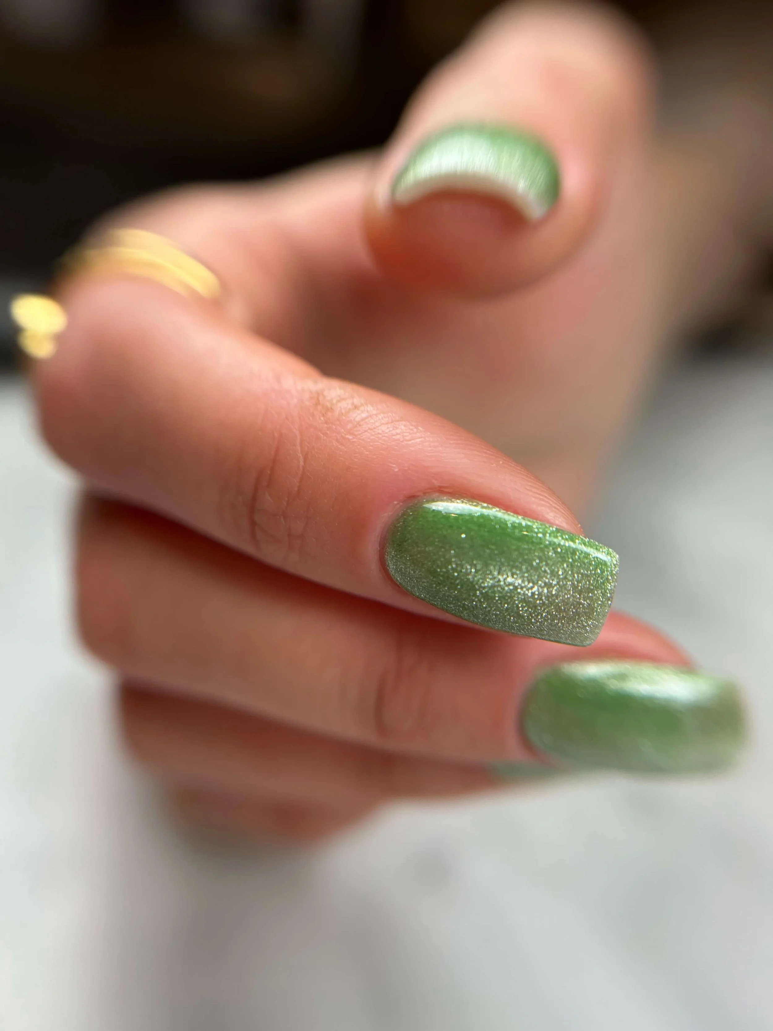 green-sparkly-nails-distilled-pedicure.jpeg