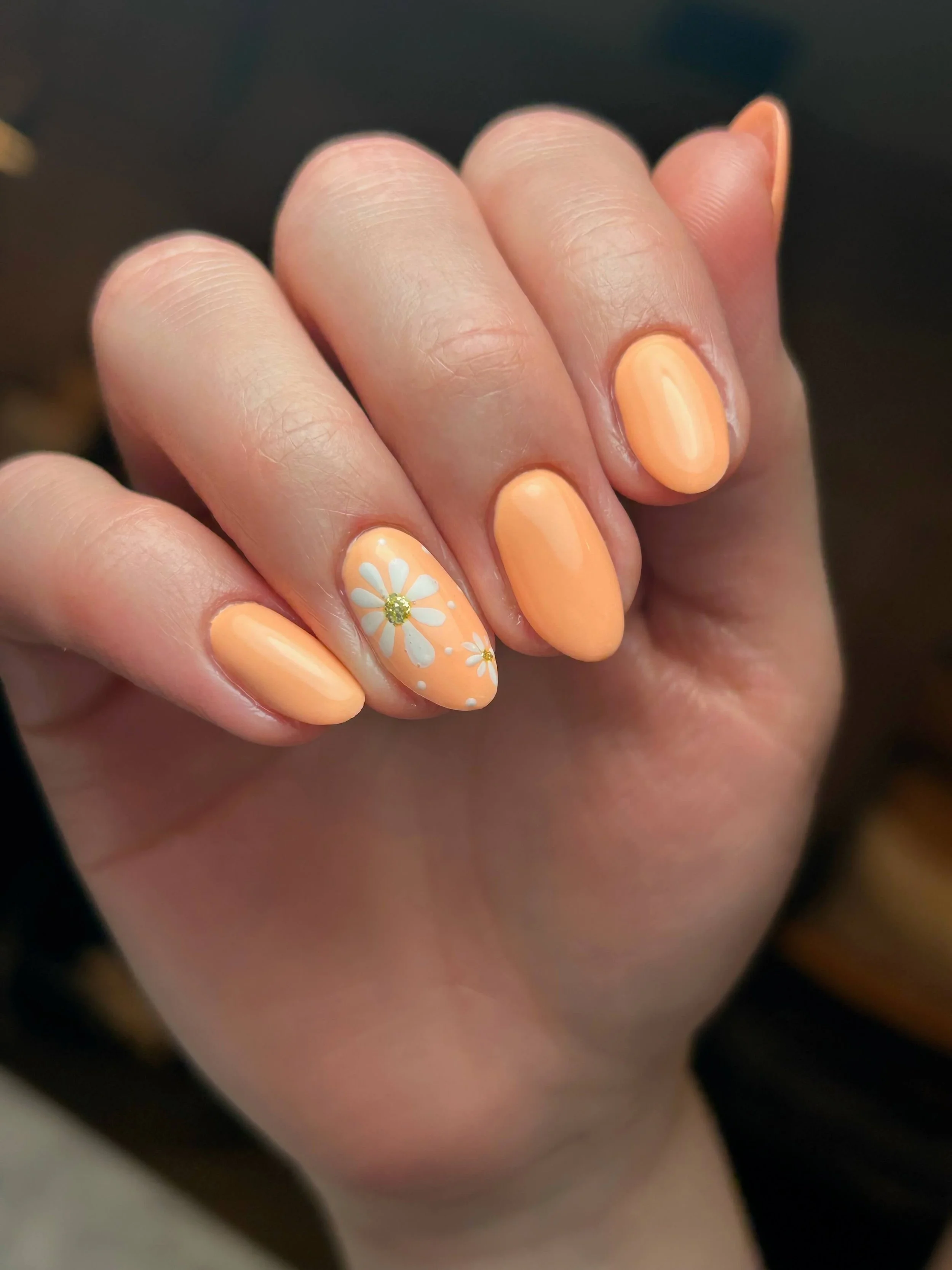 peach-nails-with-daisy-from-distilled-beauty-bar.jpeg