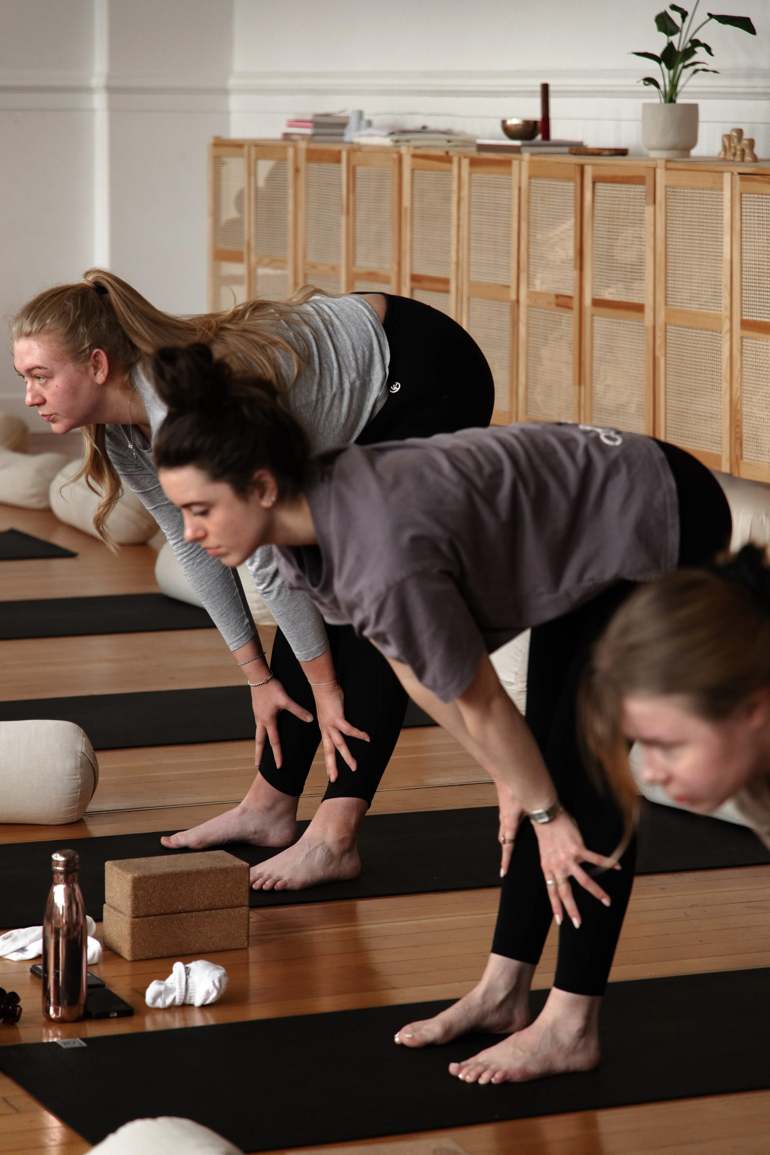 Person stretching in yoga class at Reset studio Glasgow