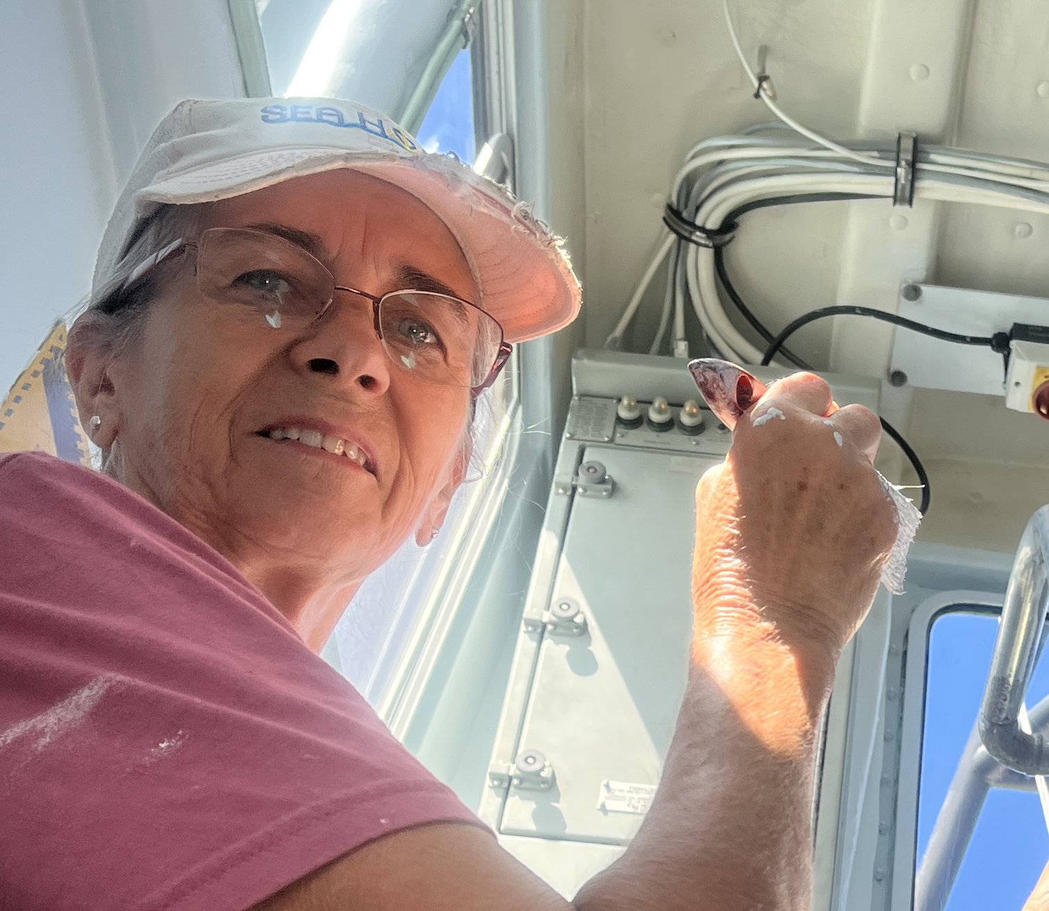 Mary painting in the pilot house