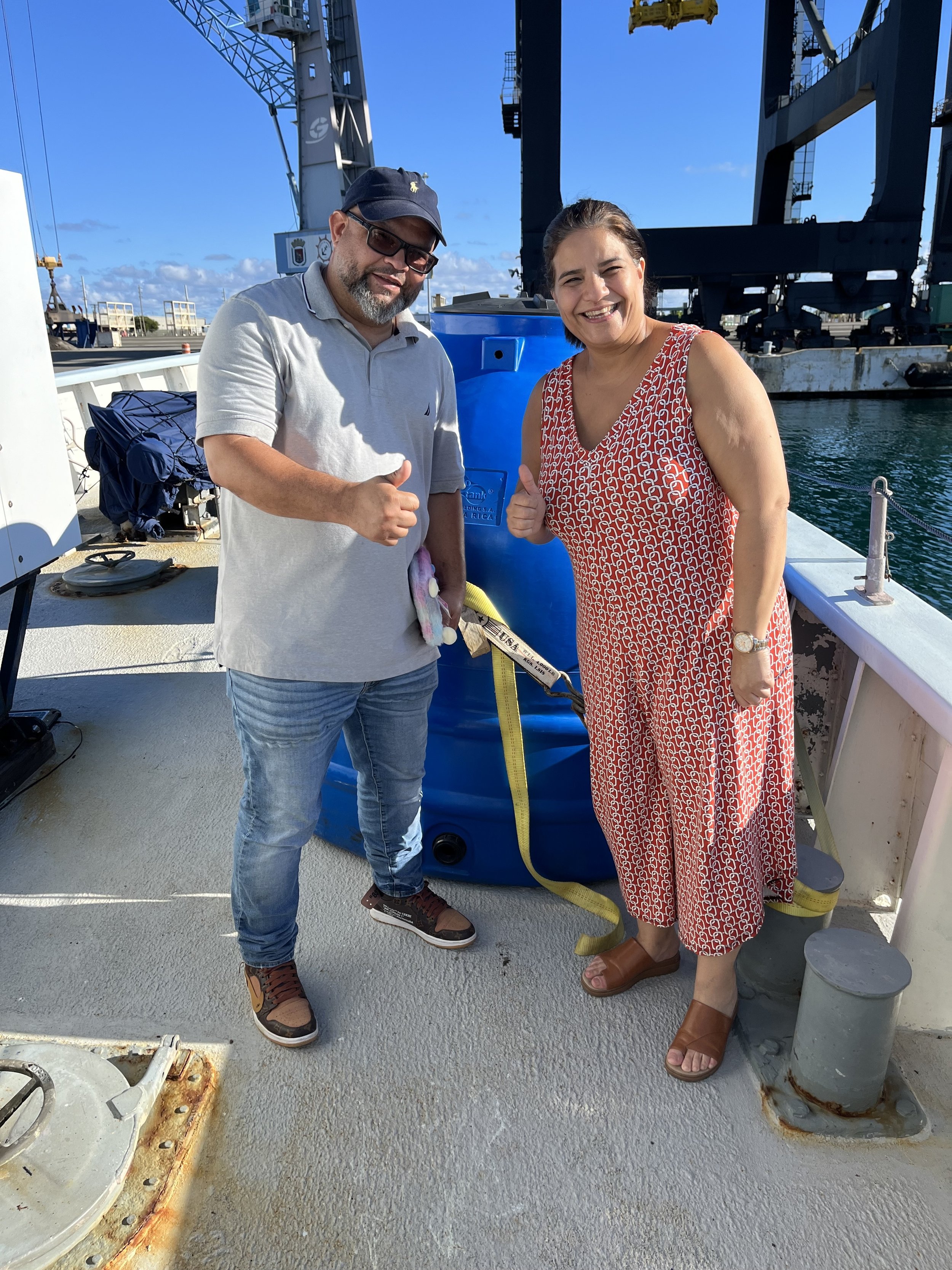 Pastor Jorge Laboy and his sister Abigail Laboy helping us load