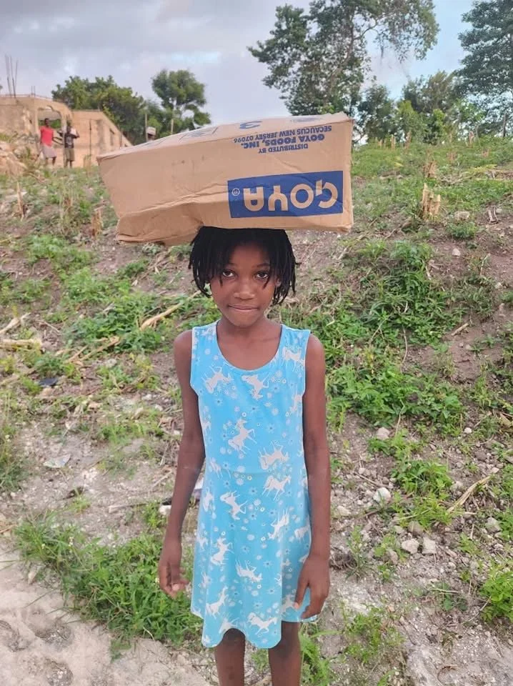  She is carrying 24 pounds of beans 