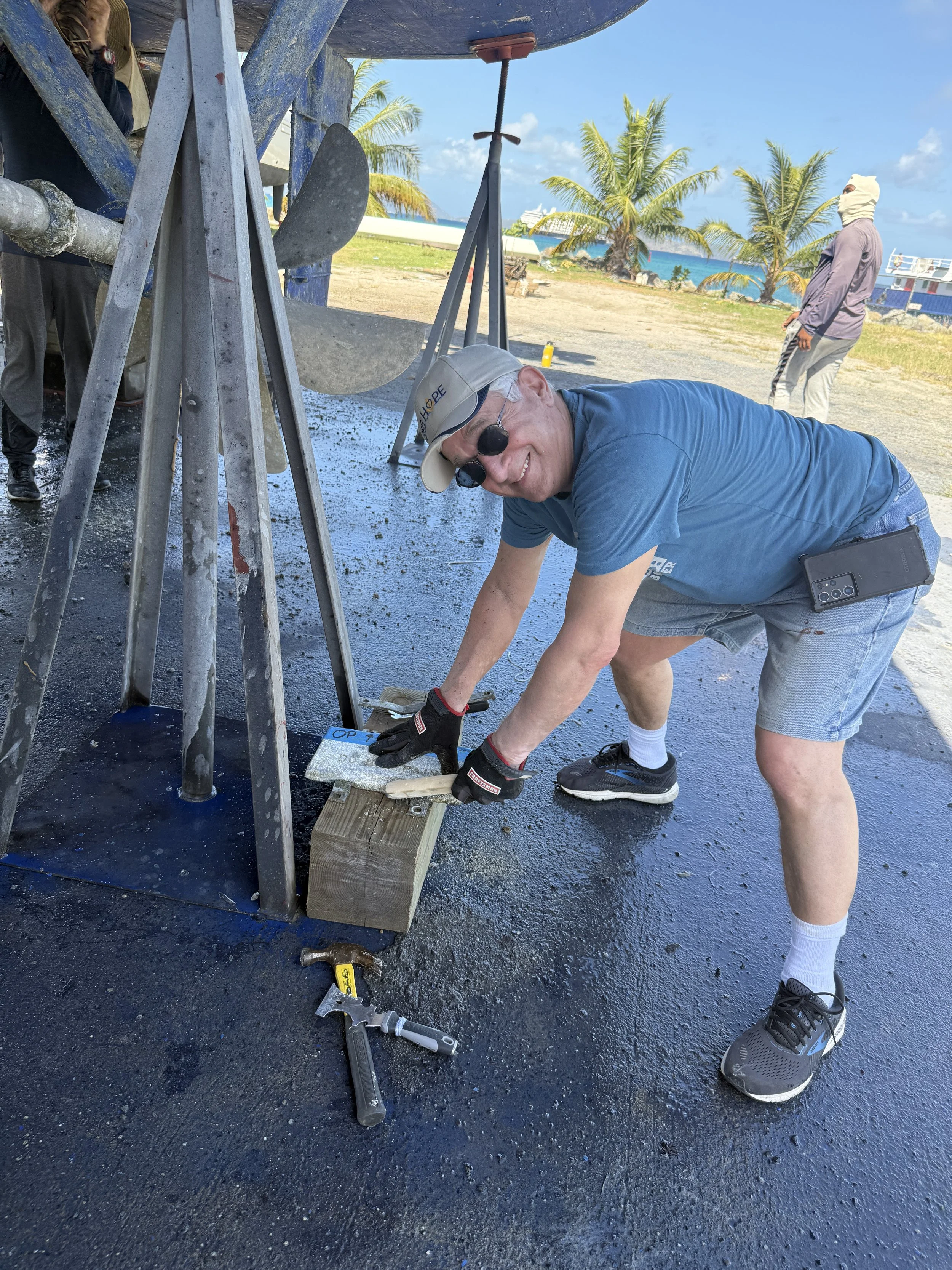  Todd Orlando helping with zinc anode removal 
