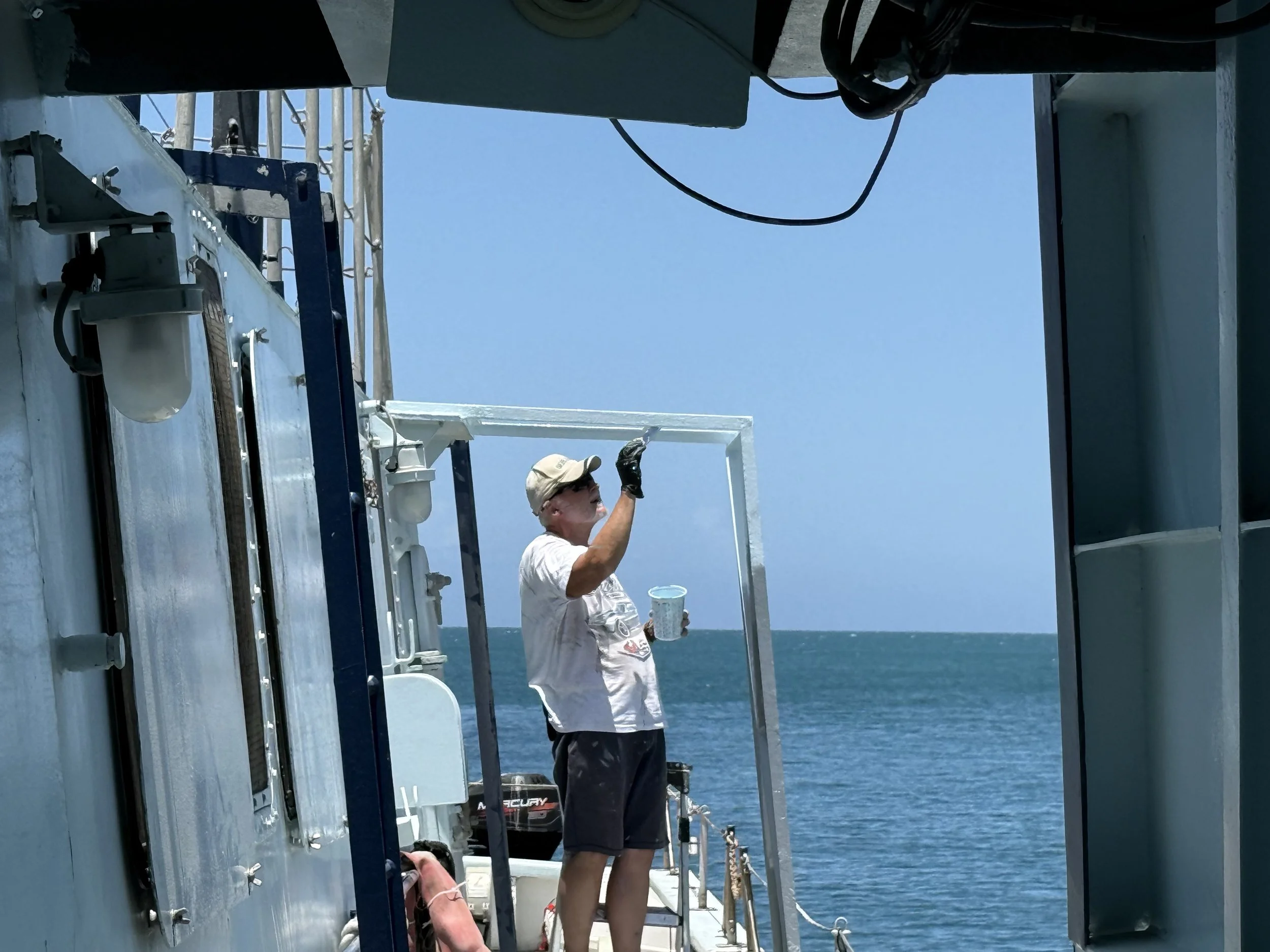 Pastor Shaffer working on the port solar panel support