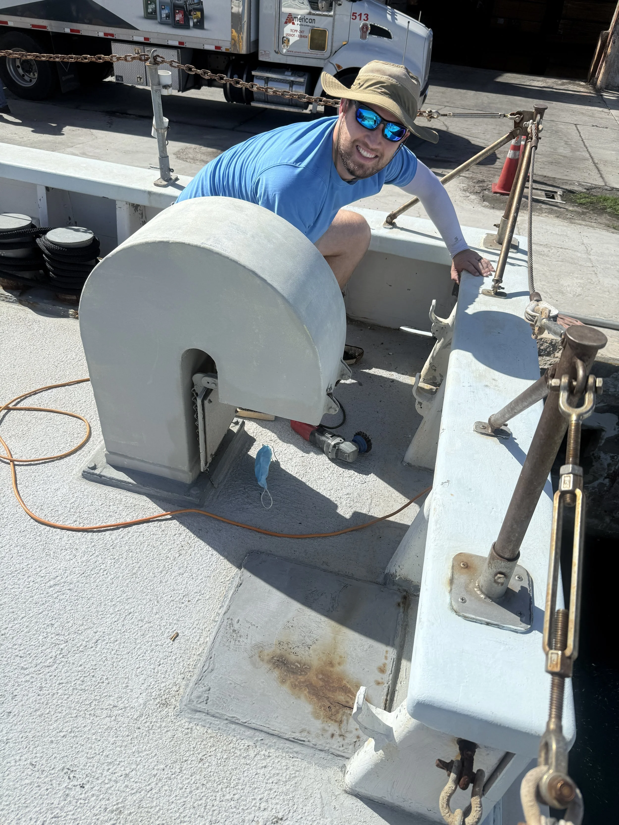 Pastor Josh working in the heat on the gunwales.  The heat here can be oppressive