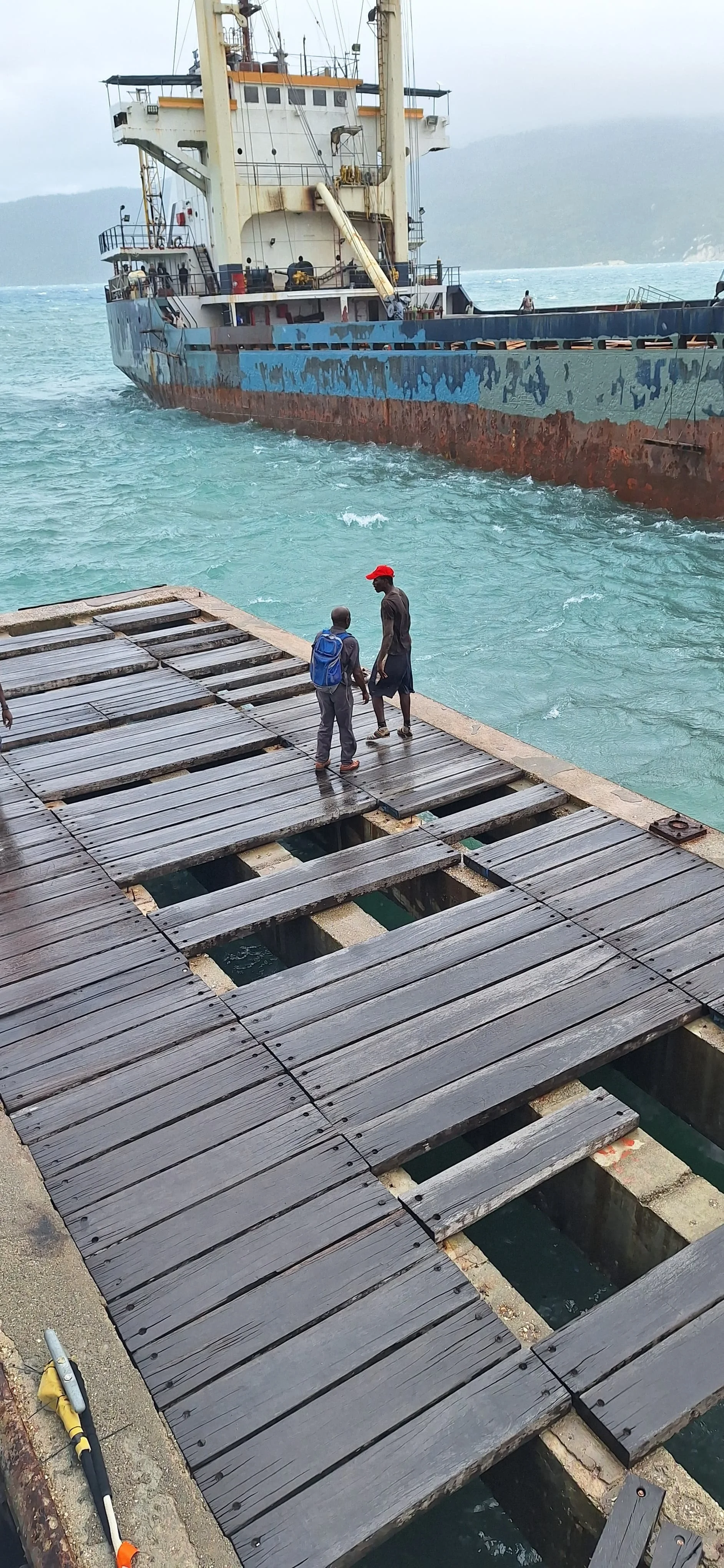 The little pier is not in good shape.  Boards we put down a couple of years ago are missing