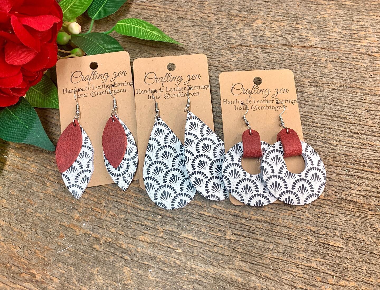 Which do you prefer? Plain BnW or accented with red? 
New leather! BnW peacock patterned accented with red. 

www.craftingzenleather.com

#craftingzenleather #earrings #armstrongjewelrystudio #leatherjewelry #leatherbracelet #shoplocal #leatherearrin