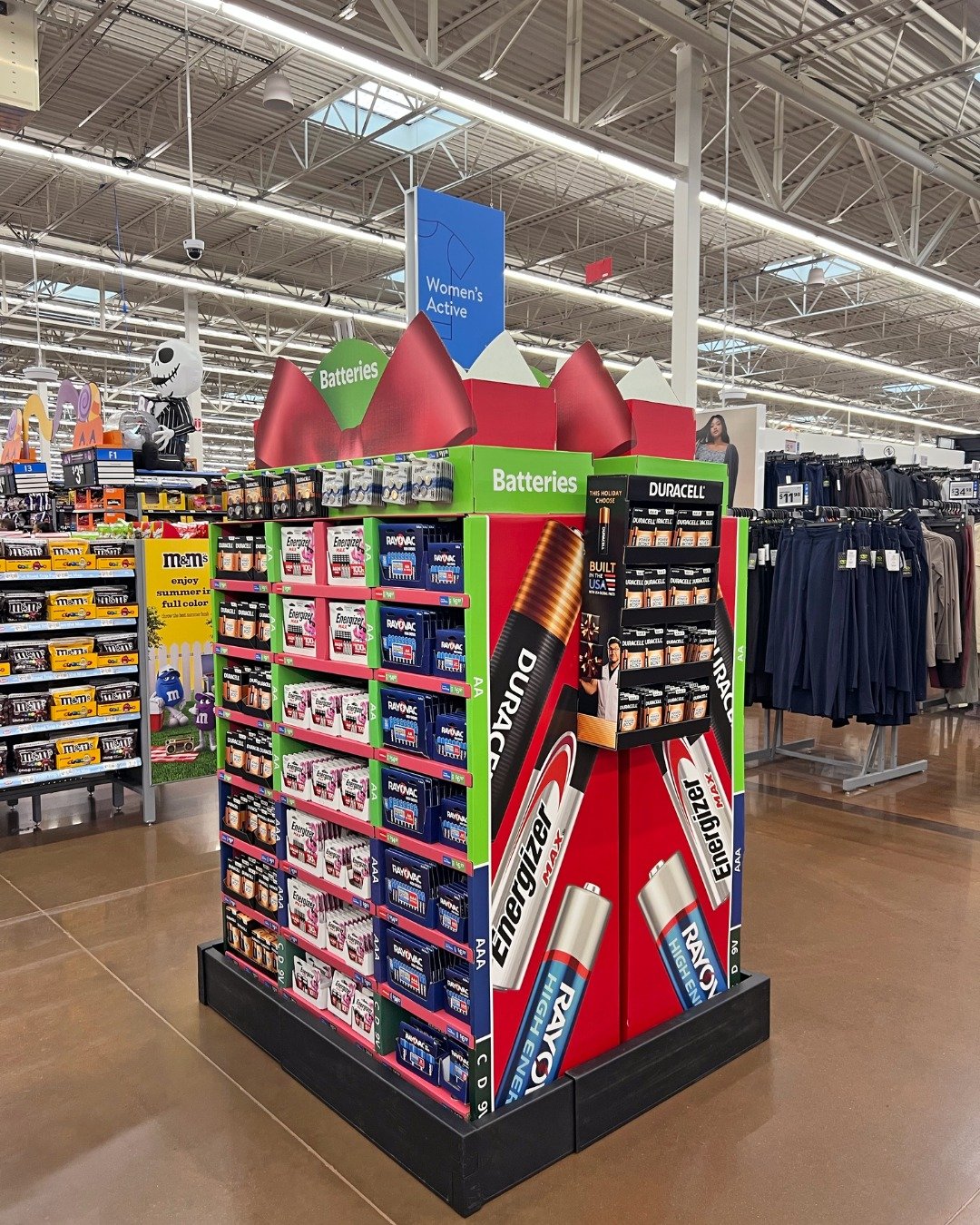 Powering up the holidays in style! 🔋🎁

Our team at Kendal King designed and produced this vibrant battery display in @Walmart stores. The oversized graphics, holiday bow details, and fully stocked shelves make it easy for shoppers to grab the power