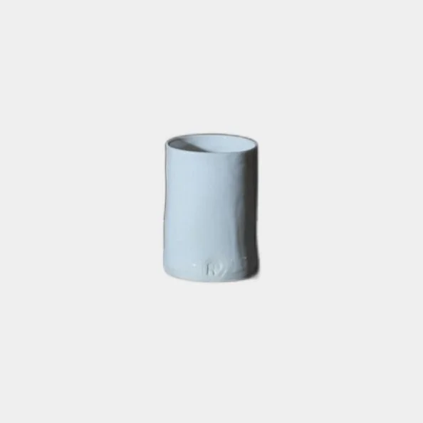 handmade porcelain espresso beaker pottery.png