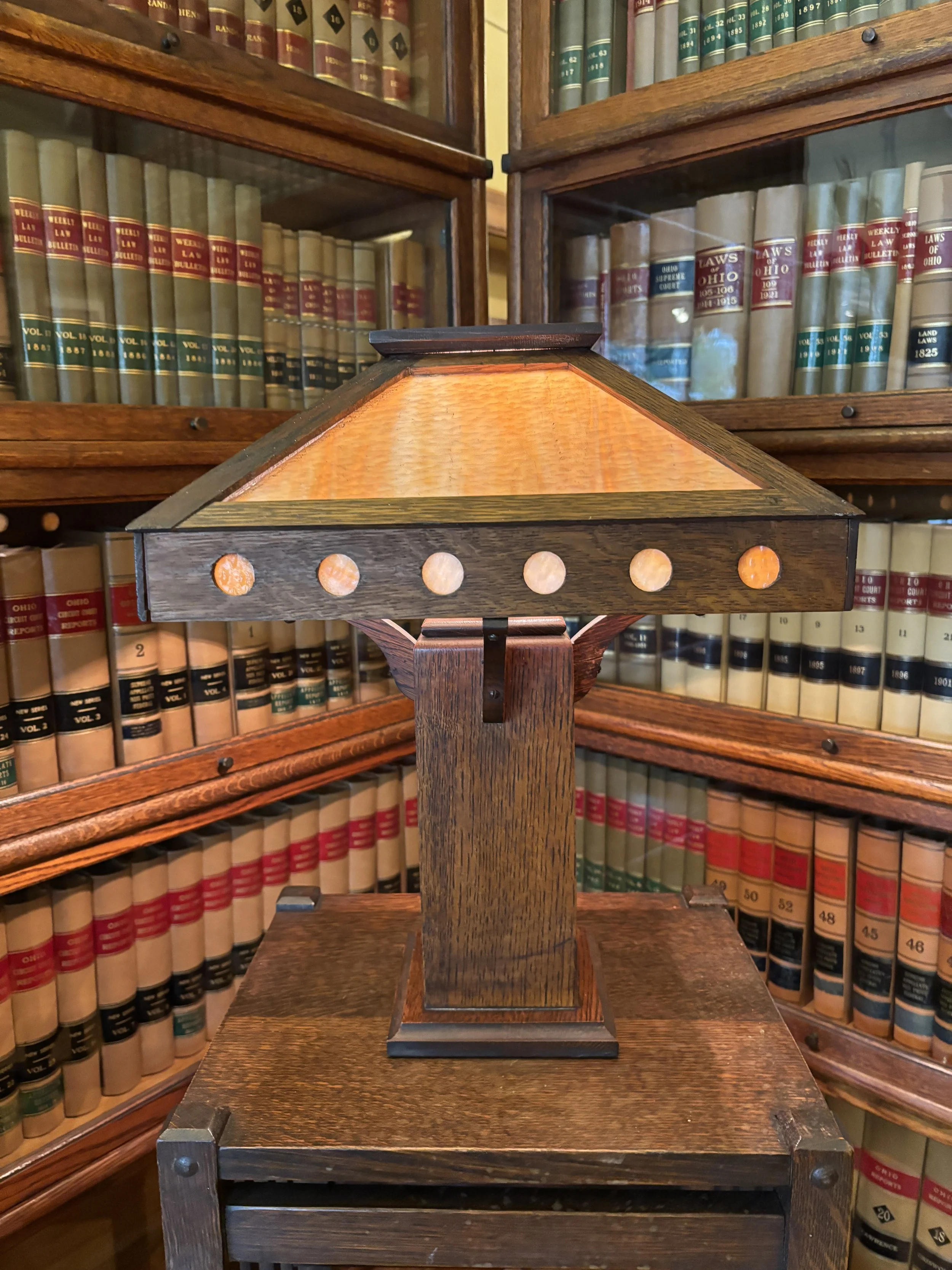 Antique Craftsman style table lamp with cut outs and slag glass