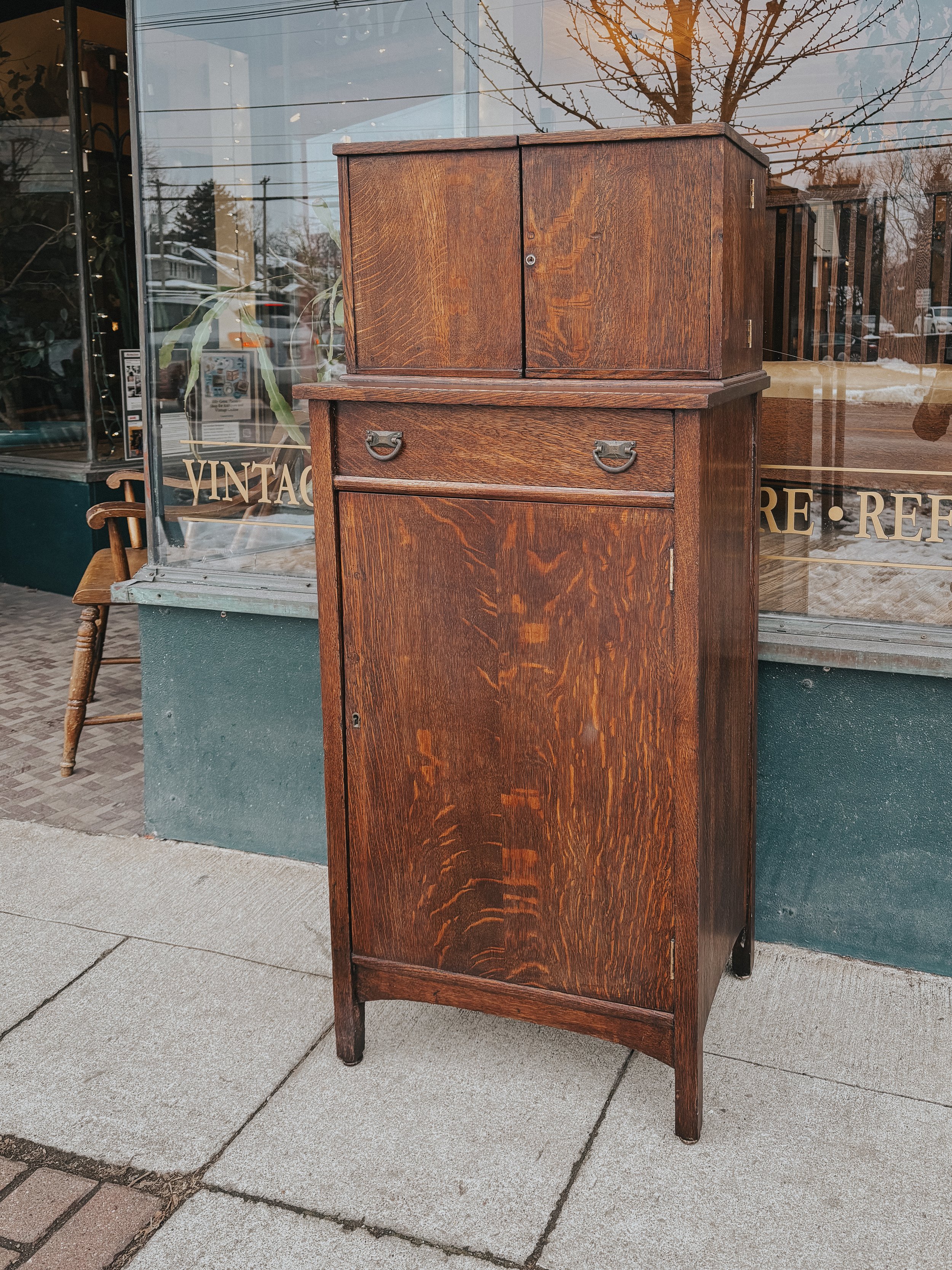 Detailed photos of an Antique Mission Bar Cabinet showcasing its rich oak finish, classic Arts and Crafts design, and expert craftsmanship. Perfect for adding vintage elegance to any space