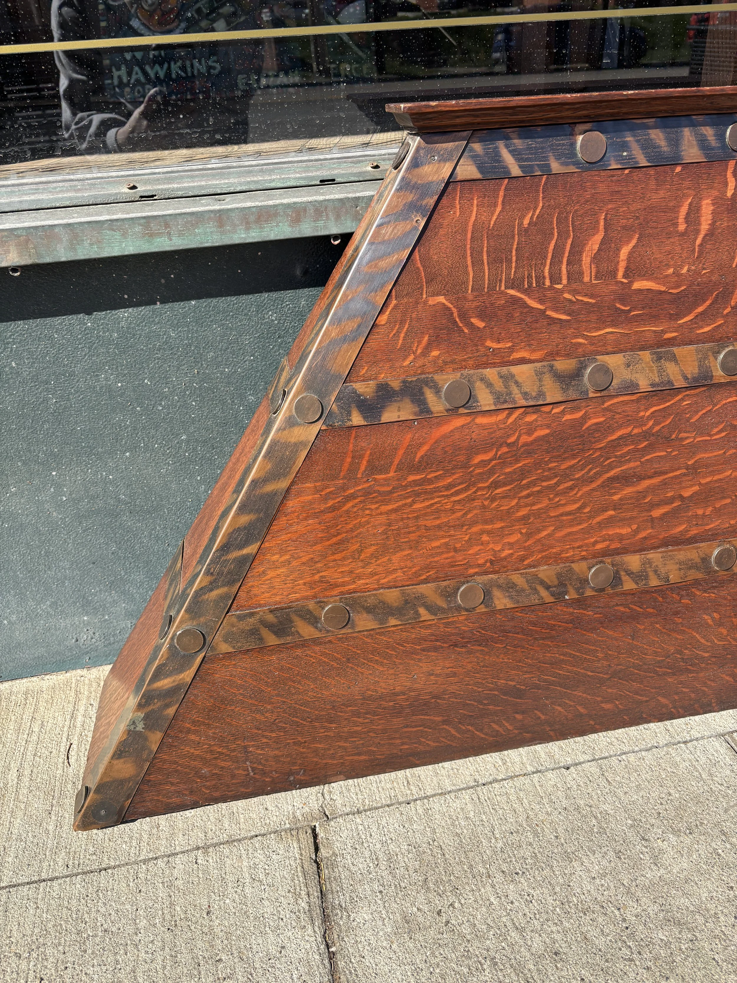 Tiger oak grain detail on antique quarter sawn oak Mission style fireplace hood