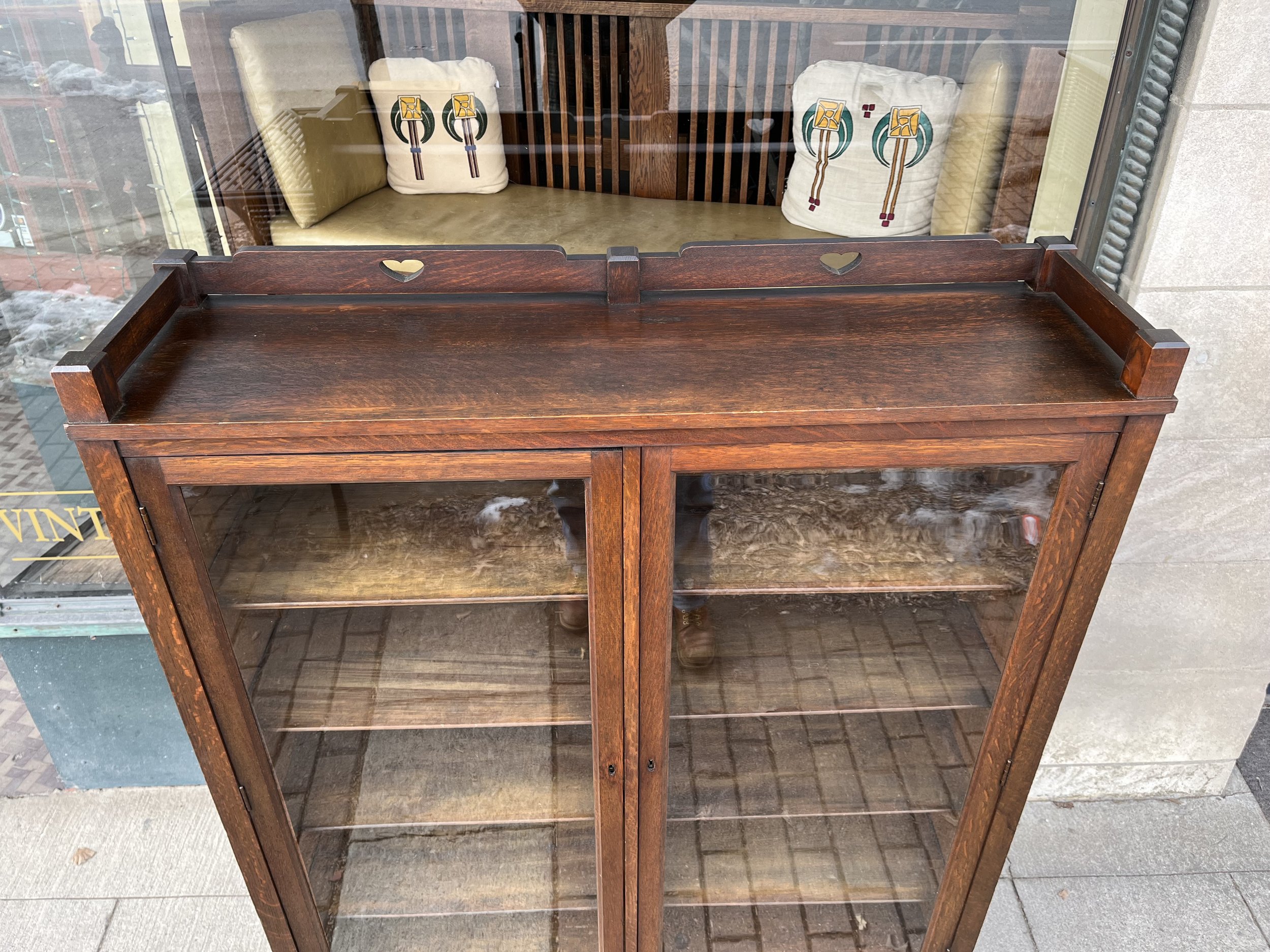 Top of stickley style bookcase with heart cutouts