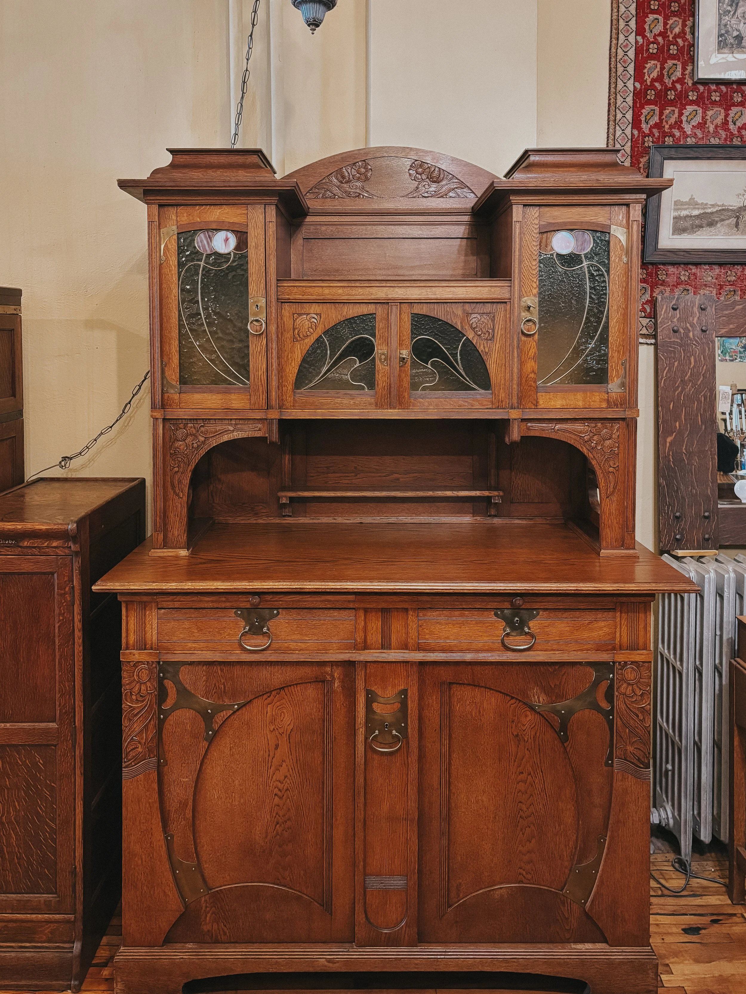 Art Nouveau Buffet with leaded glass and carved detailing