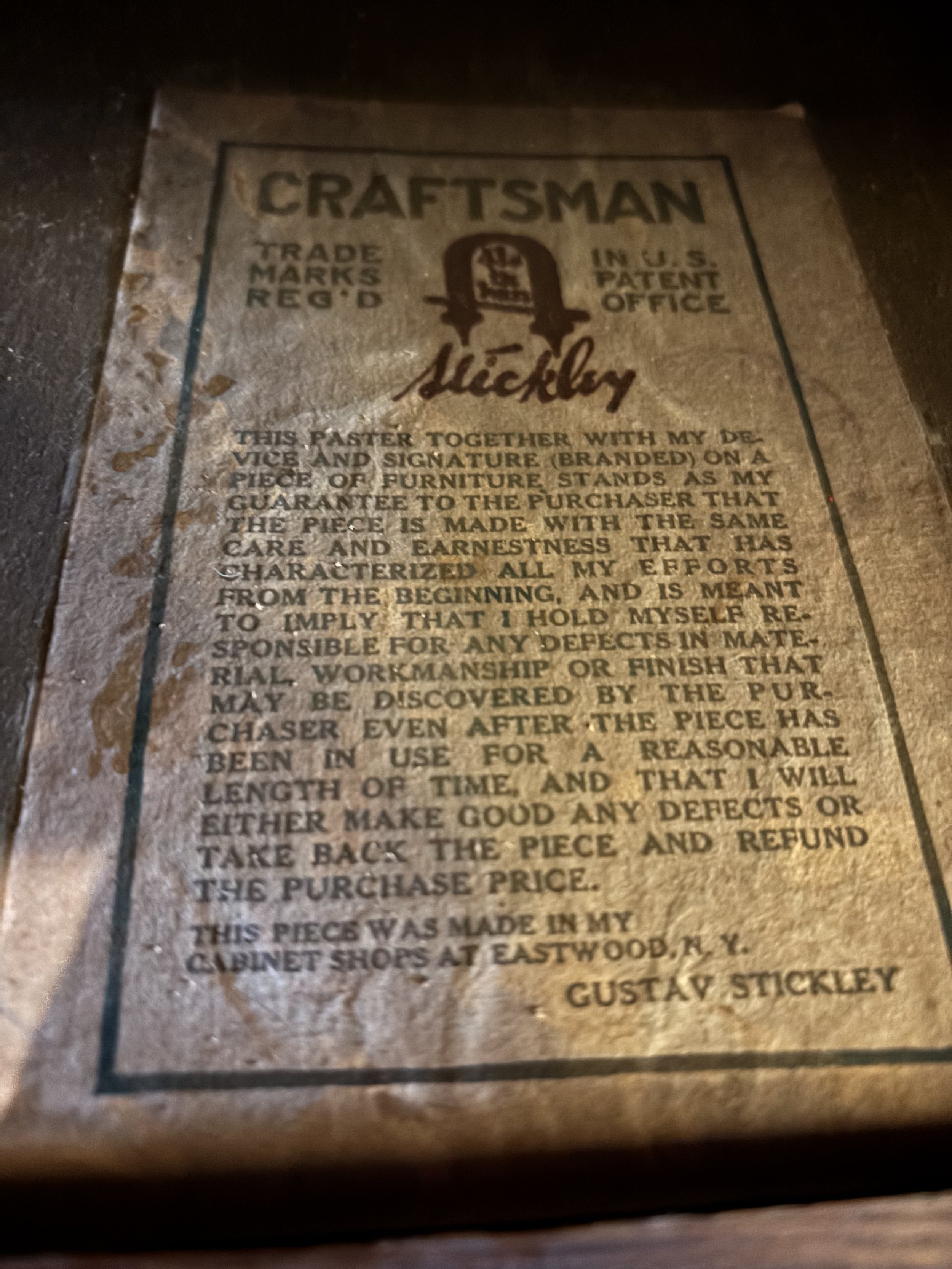 Photo of the paper label signature on the Gustav Stickley Sideboard