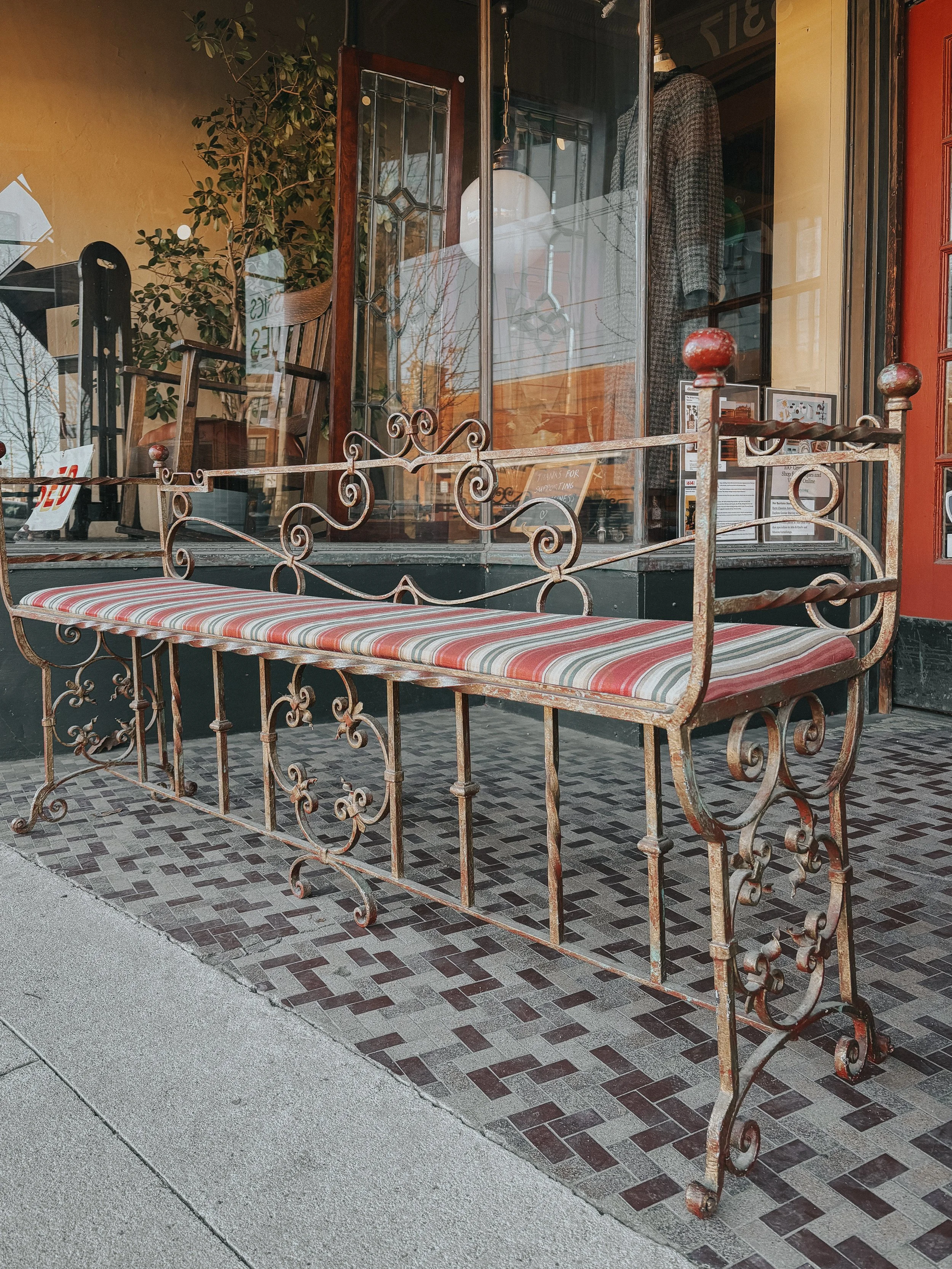 Entryway bench with beautiful wrought iron detailing