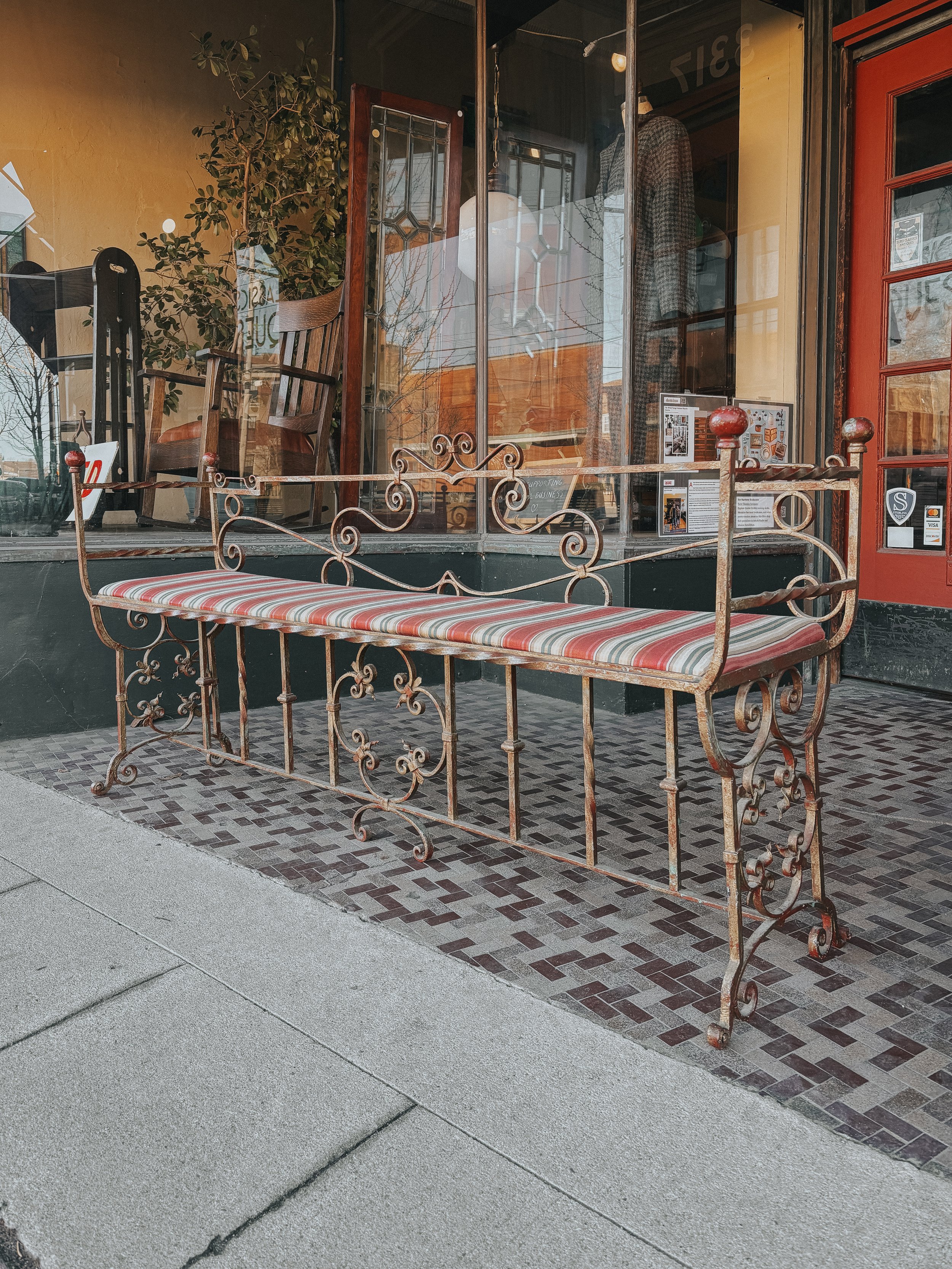 Antique wrought iron bench