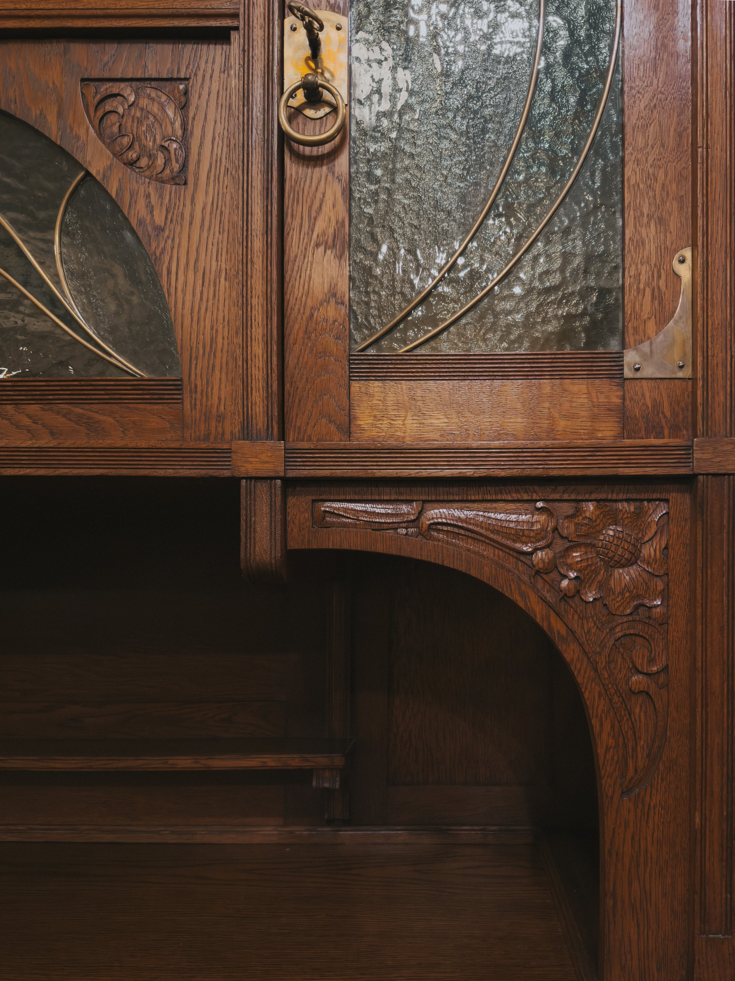Leaded glass and carved detailing
