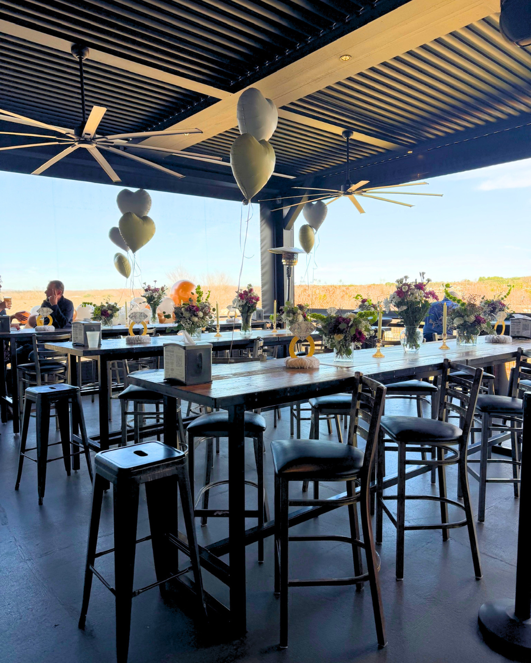 Covered rooftop event space at Royal Bliss Brewing available for weddings, rehearsal dinners, showers and corporate events.
