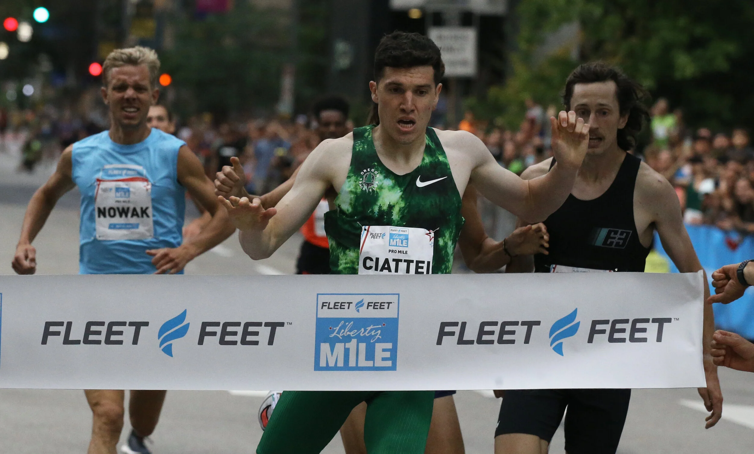 Vince Ciattei breaks the tape in 3:58.39 to claim his first professional victory at the Liberty Mile in Pittsburgh. Photo by Liberty Mile