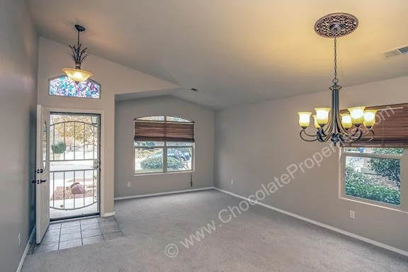 10420 Cantacielo_p_inside entry and living room A.jpg