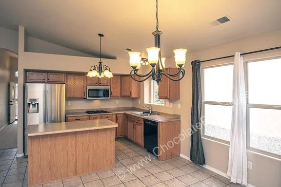 10420 Cantacielo_m_dining area looking at kitchen A.jpg