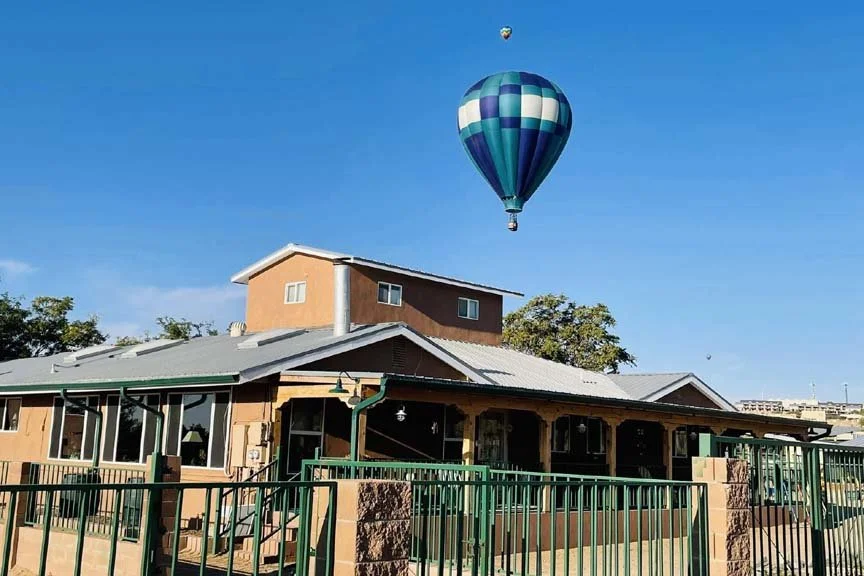 reclining102_front of home with balloon_IMG_3227[1].jpg