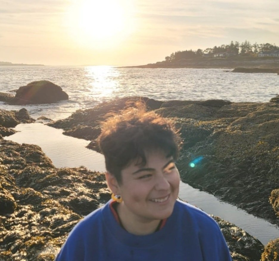 &bull; Meet the Editors! &bull;

xochi quetzali cartland is a queer and Latina poet, seamstress, and transformative justice practitioner. She graduated from Brown University with a BA in literary arts and has since moved to Washington, DC, where they