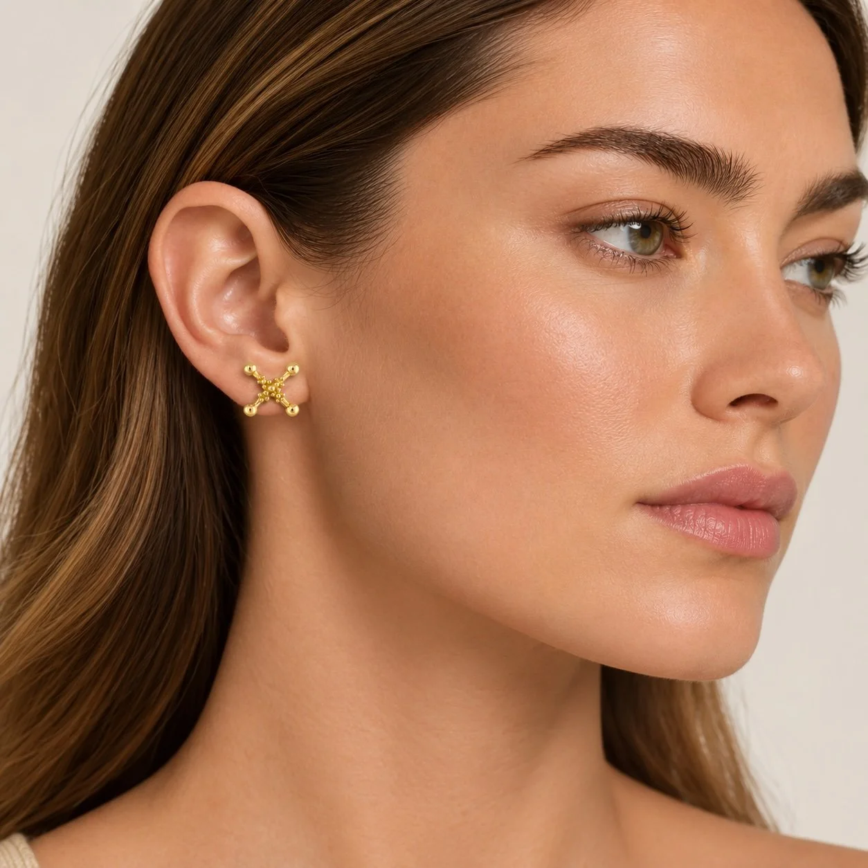 Lady-X-Stud-Ear-Model 1.jpg