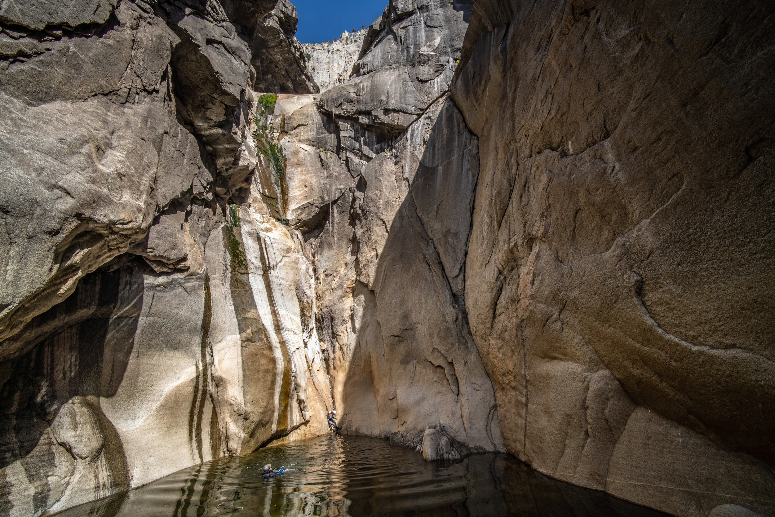  Rappeling into frigid water. 