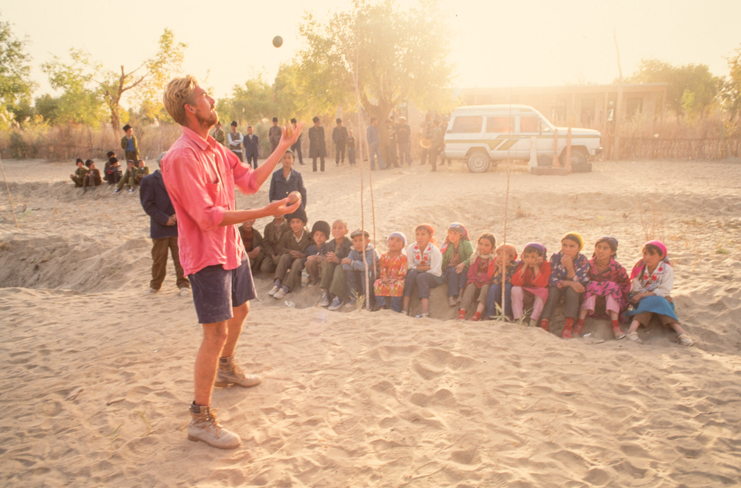  Mark puts on a show for some of the Uighur children at an outpost deep in the desert.  