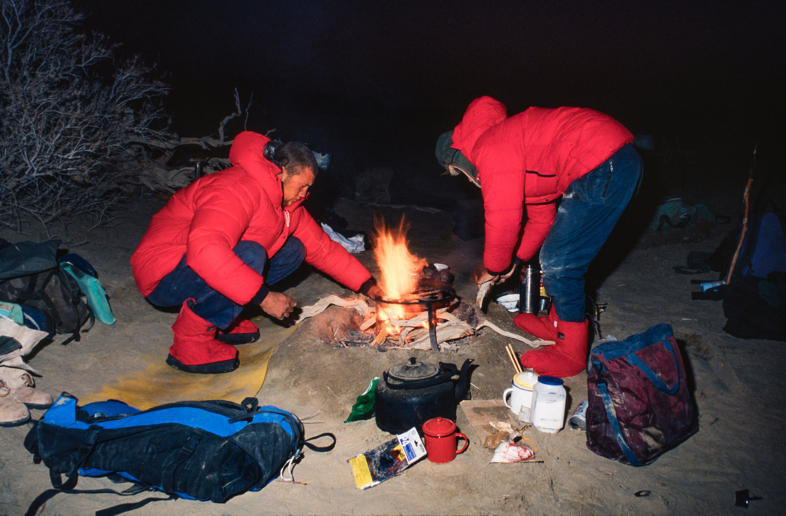  Rab gear was a sponsor of the expedition and here Rupert and Carolyn get good use of their Rab jackets while getting the cooker going in the predawn cold.  