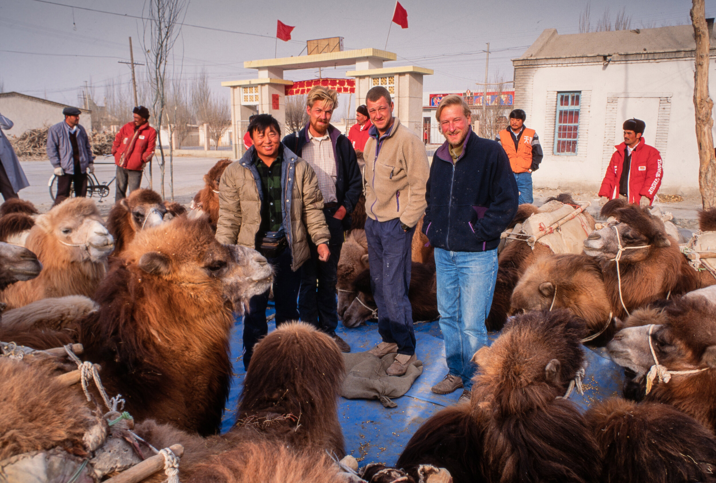  The morning after completing the crossing and after a huge community celebration, the British members of the crossing team spend their last visit with the camels before beginning the long journey home.  