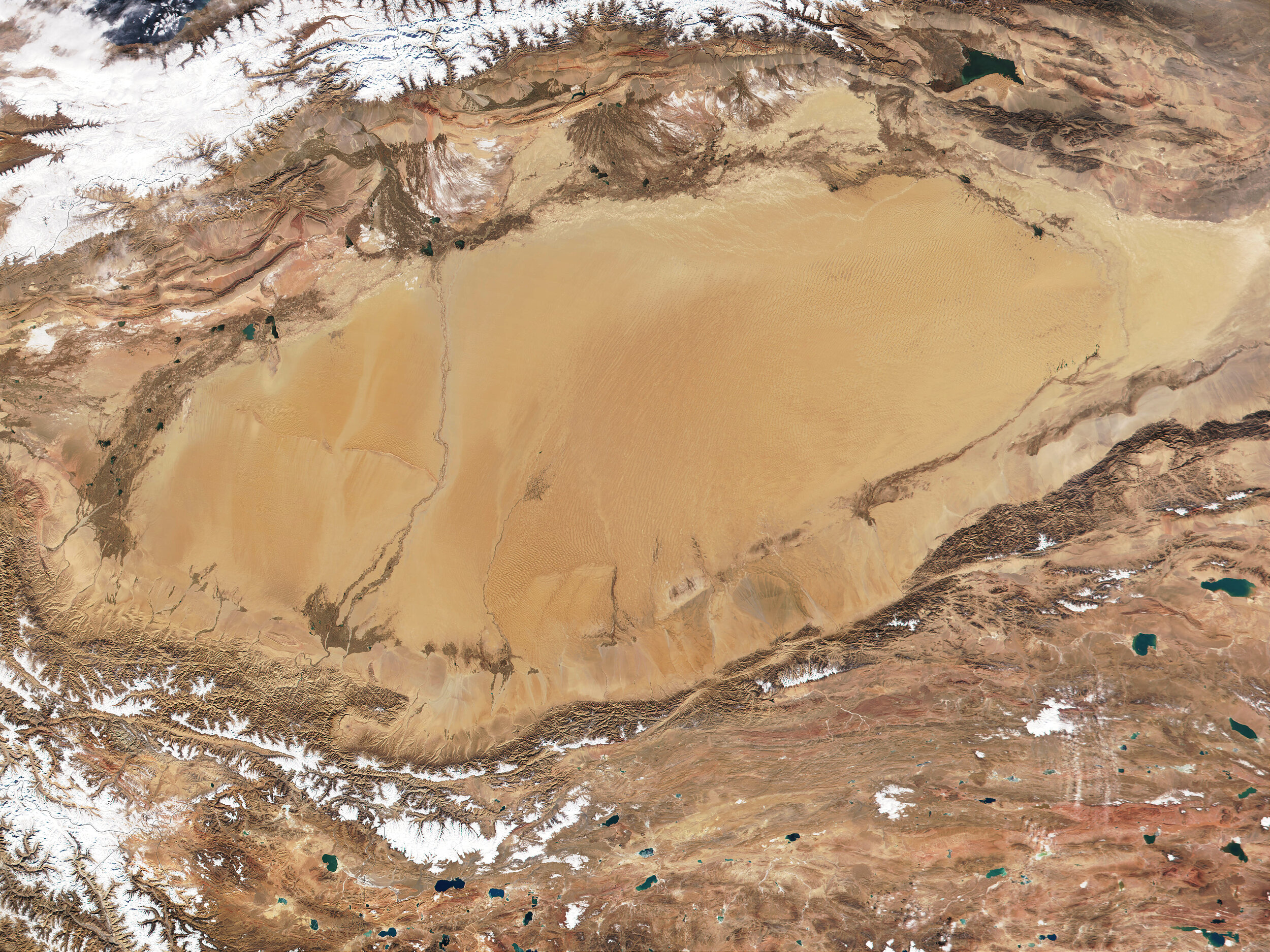  A more detailed look at the Taklamakan Desert. We started our trip at the left edge of the desert and completed it on the extreme right of this image. You can see a couple of the seasonal rivers that come into the desert from the South that were use