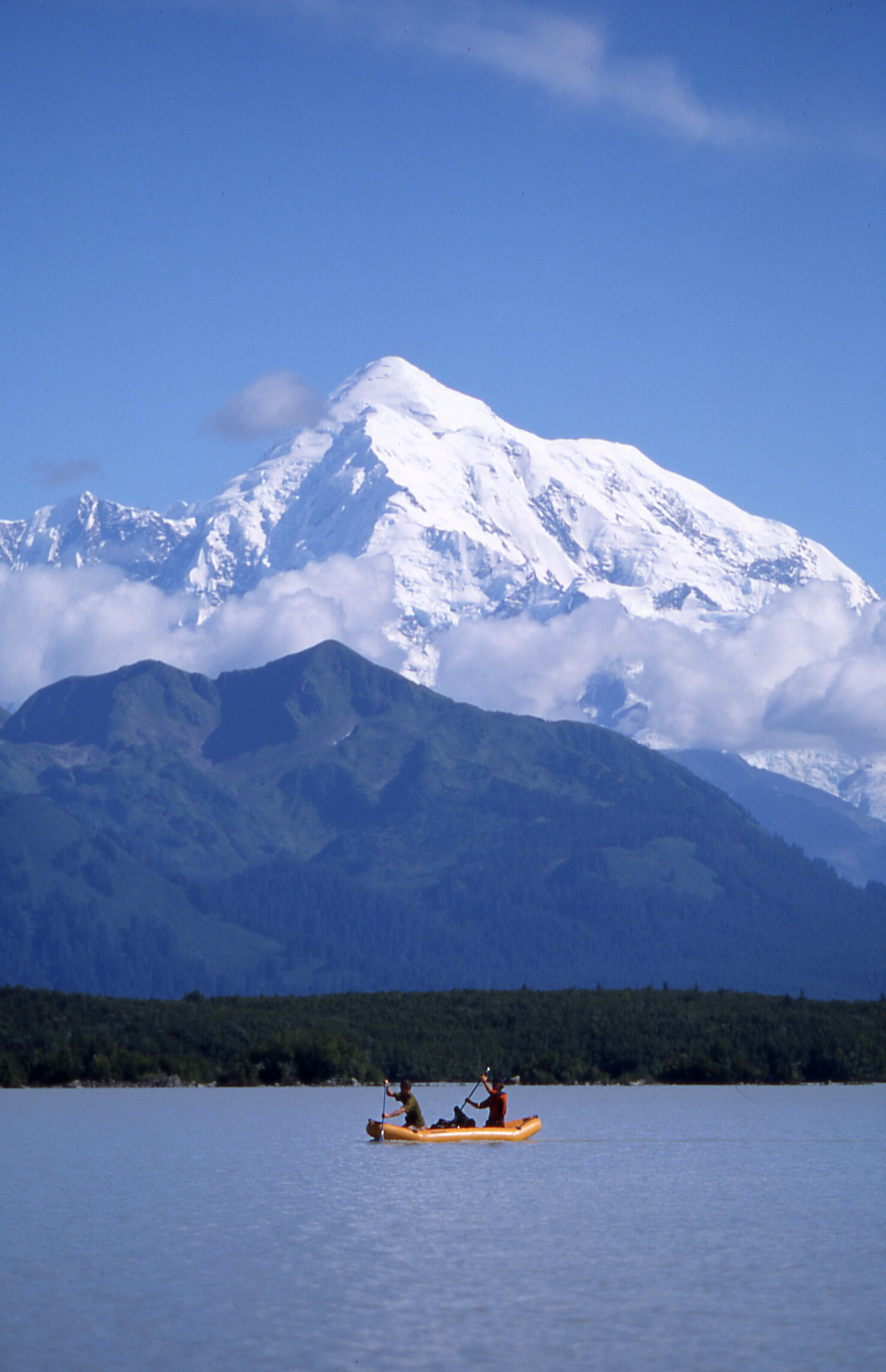 Rupert and Tom paddle in the Grand Plateau Glacial lake with the magnificent Mt. Fairweather in the distance.  