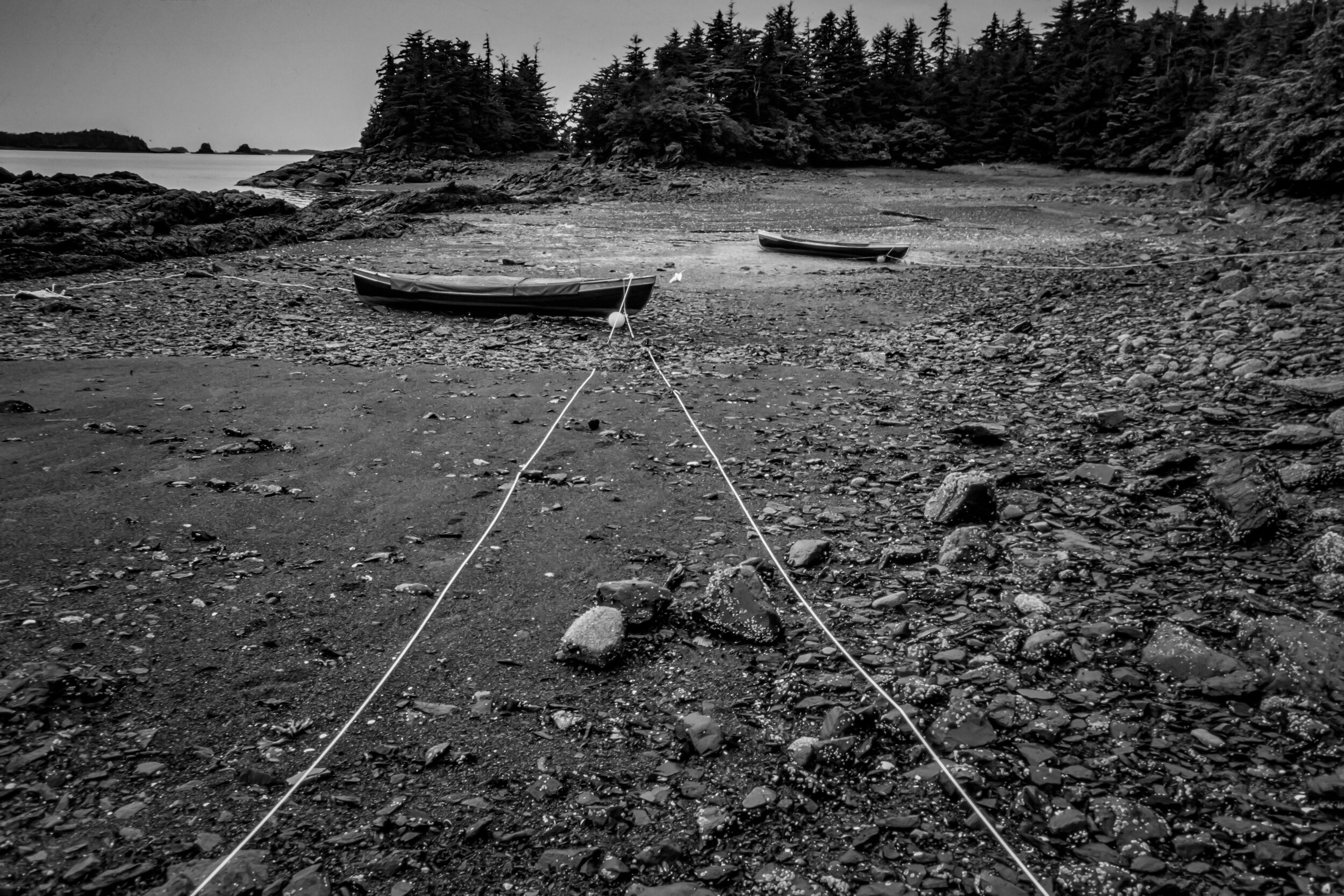  While we always consulted tide charts when setting up our mooring lines at night, sometimes we mis-calculated the depth of the water we were in! Our boats high and dry at morning low tide.  