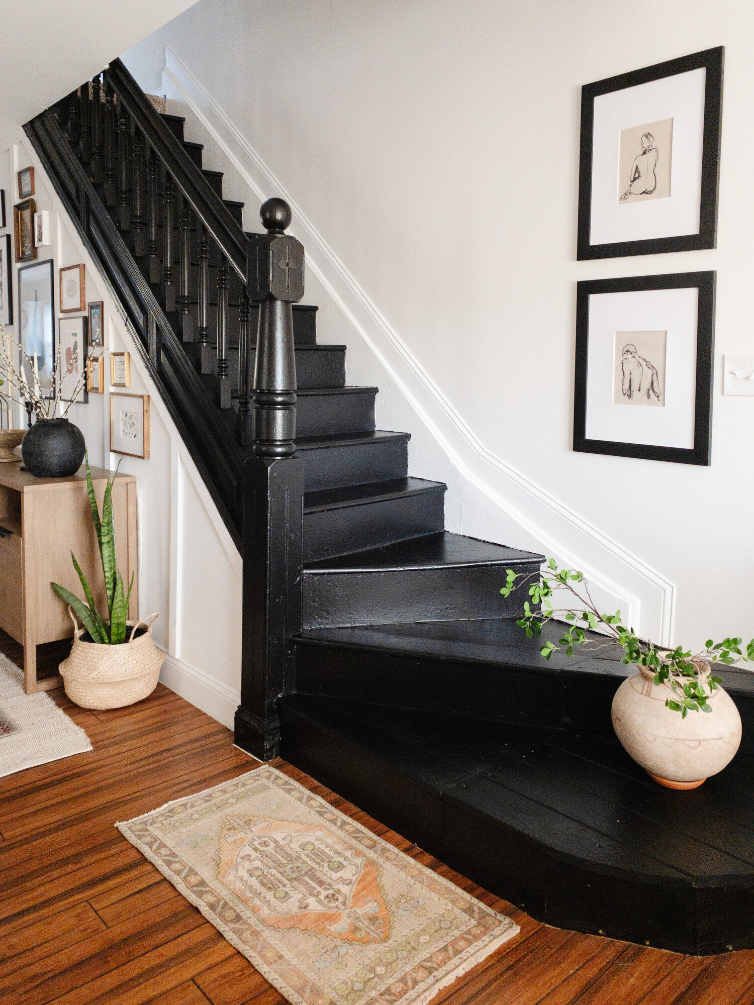 photo of painted black stair risers and stair treads