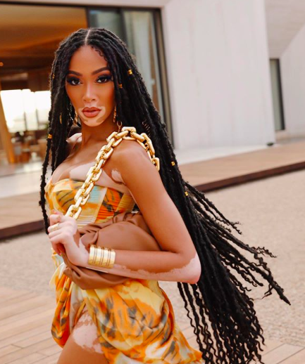 Summer's still in—Janet Jackson pulls through with texture-perfecting, humidity-blocking looks! 