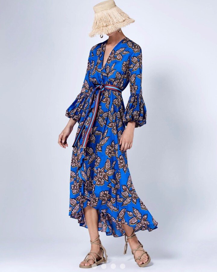 This breezy and bright new arrival is ready for your next vacation. The dress wraps at the front and closes with a contrasting sash. Wear it with flat sandals or upgrade it with a heel. So many options!