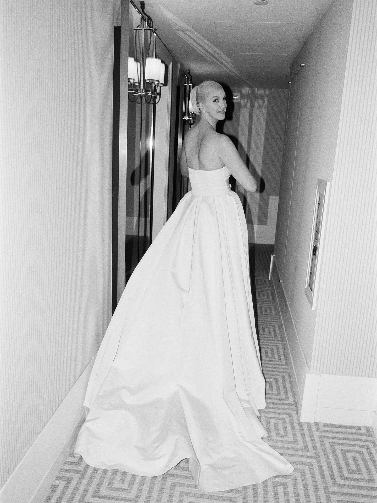 For her own wedding, @mollymoorkamp designed three distinct looks: a lace ensemble for her morning ceremony, a tailored pink tweed suit for post-ceremony martinis at @cafecarlyle, and an evening strapless silk faille gown with a bow detail for dinner