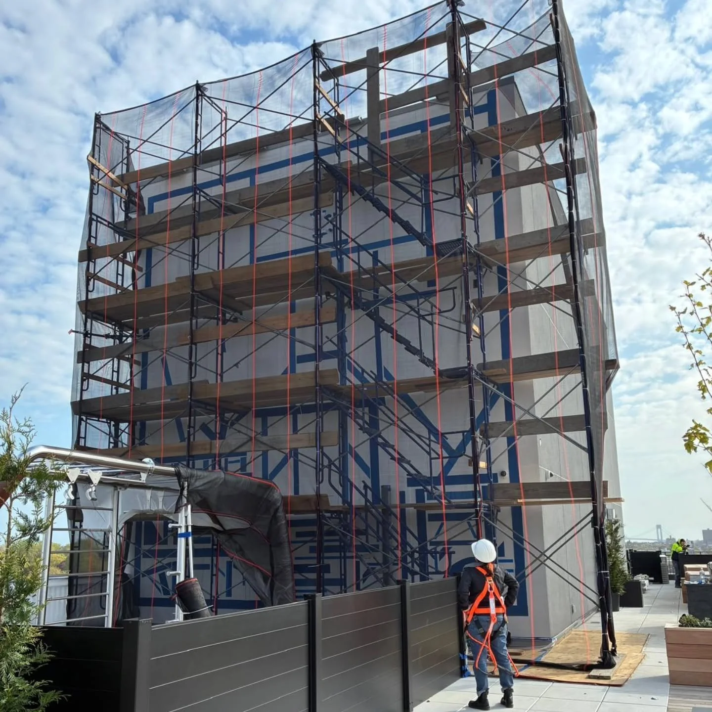 Something special is rising on the roof @onesunset. Sneak preview of mural in progress by local Sunset Park artist @ilianaemilia. Stay tuned for updates and the final reveal coming soon!