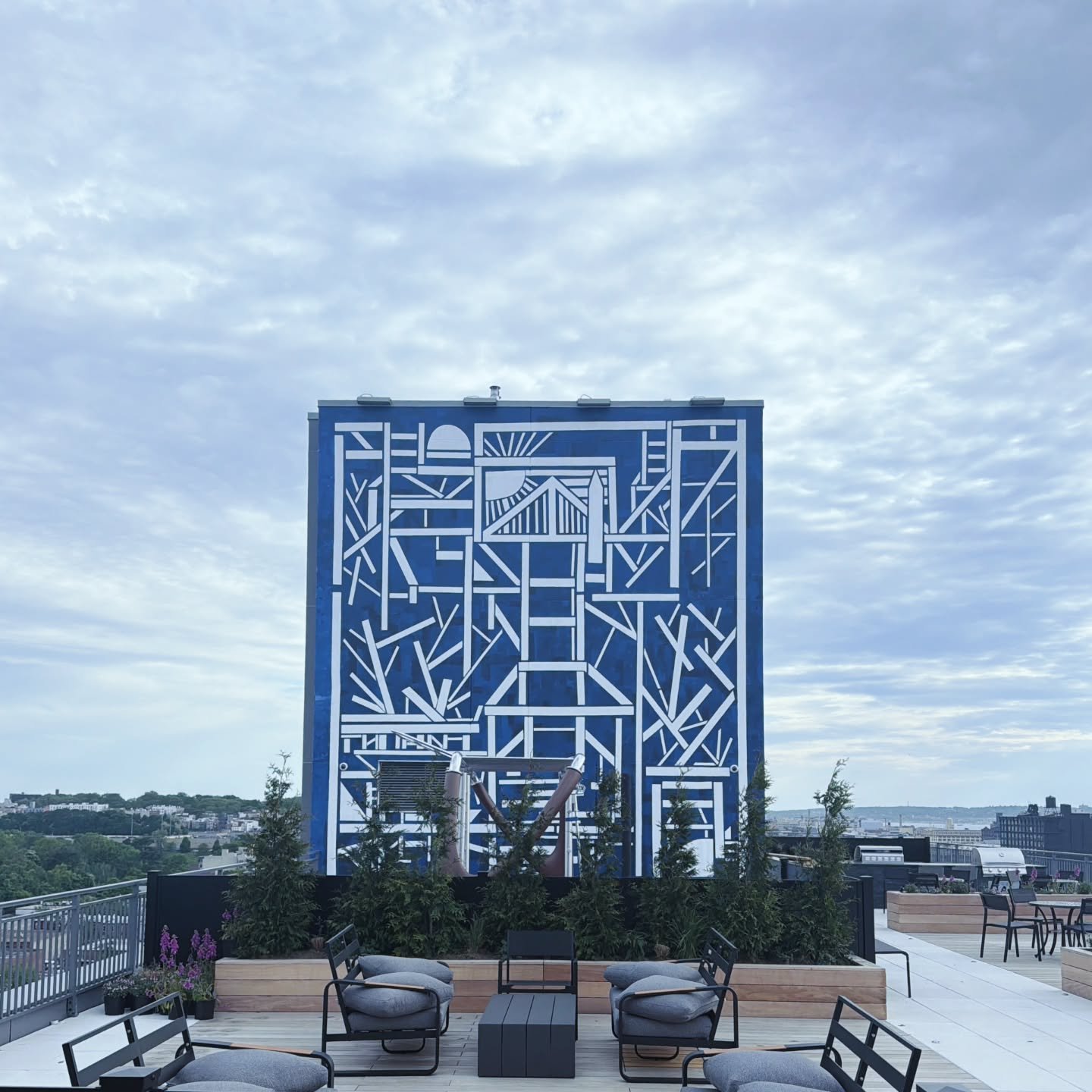 Introducing "Story Views from One Sunset, 2026," a stunning 28' x 30' mural rising on the 14th floor rooftop of @onesunsetbk. Designed and painted by local artist @ilianaemilia (and her wonderful team, including Monty and Alex), she says th