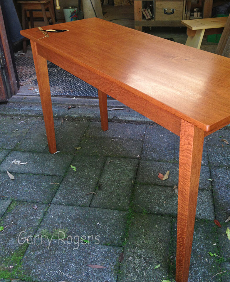 leg and rail detail male Regent table.