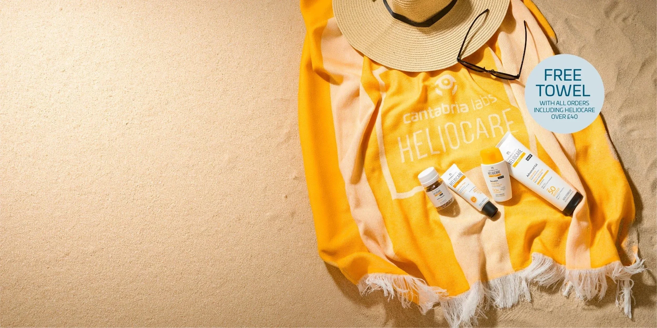 Heliocare 360 SPF skincare products with complimentary beach towel offer at Milk & Honey Belfast skincare clinic.