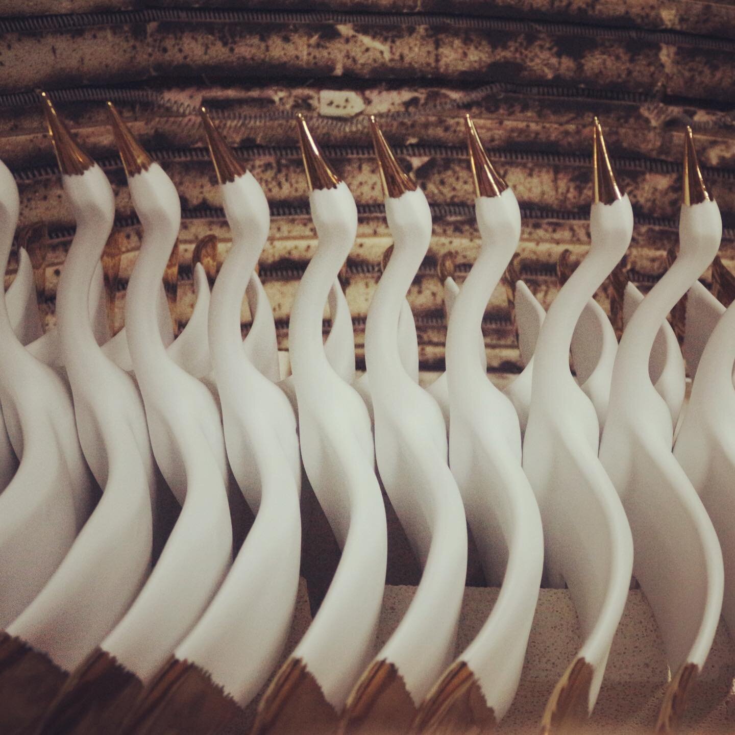 Heron porcelain bird sculptures in the making. Finest bone china, decorated with 10carat gold and fired with the greatest skill. Many broke before looking so pretty 🙌🏼. 
Thank you to our wonderful workshop.

#sitespecific #installation #porcelainsc