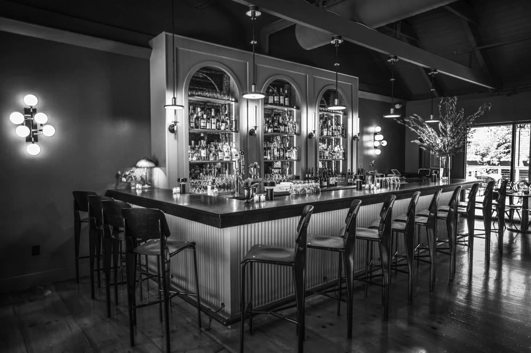 black and white bar and stools