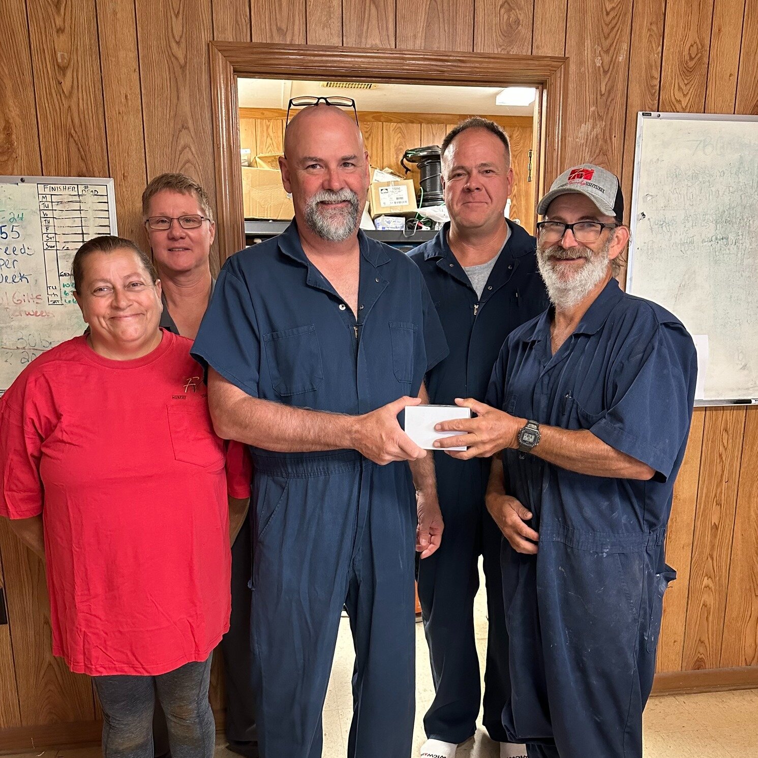 Congratulations to Ray Wheeler of NC Wolf Sow Farm who is celebrating 15 years with MFV! Standing with him (L to R) is Farm Manager Mary Brown, Production Manager Mark Spearman, Sr. Vice President and Director of Operations Terry Tate, and Sr, Produc